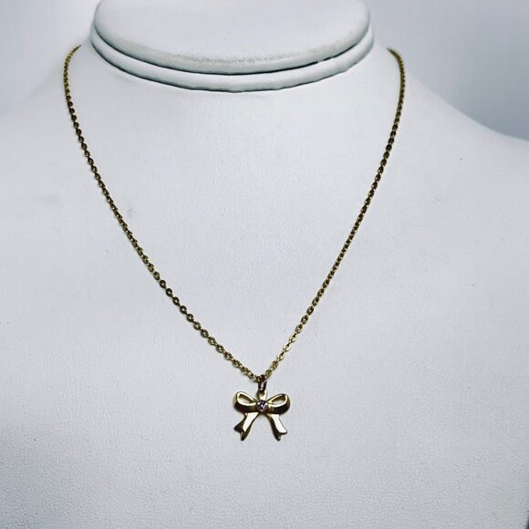 Unbranded Jewelry - Gold Tone Cable Chain Necklace With Pink Rhinestone Bow Pendant (5702)